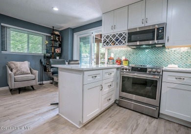 OUTSTANDING remodel, this Home is Dreamy! Quartz countertop on Twin Lakes Village Golf Course in Idaho - for sale on GolfHomes.com, golf home, golf lot