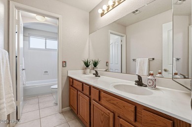 A Botanical Masterpiece Backing to Estrella's Twin Lakes. Set on on Estrella Mountain Ranch Golf Course in Arizona - for sale on GolfHomes.com, golf home, golf lot