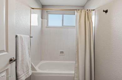 A Botanical Masterpiece Backing to Estrella's Twin Lakes. Set on on Estrella Mountain Ranch Golf Course in Arizona - for sale on GolfHomes.com, golf home, golf lot