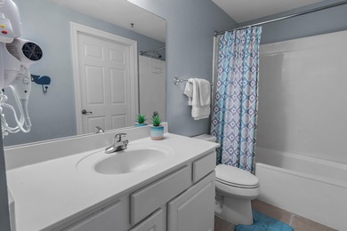 Experience elevated coastal living at 122 Seascape Blvd, Unit on Seascape Golf Course in Florida - for sale on GolfHomes.com, golf home, golf lot