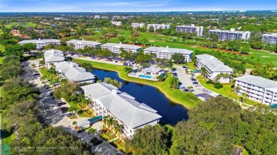 Welcome to this beautiful updated 2-bedroom, 2 bathroom condo in on The Country Club At Boca Raton in Florida - for sale on GolfHomes.com, golf home, golf lot