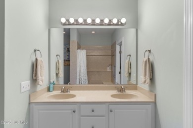 Welcome to 4158 Cambridge Cove Circle SE--an impeccably upgraded on South Harbour Golf Links in North Carolina - for sale on GolfHomes.com, golf home, golf lot