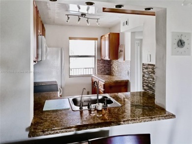 PRICE IMPROVED. Corner Condo with Stunning Golf Course Views
 on Sunrise Lakes Phase IV Golf Course in Florida - for sale on GolfHomes.com, golf home, golf lot