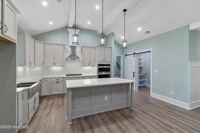 This brand new Riptide home with stunning setting and finishes on Sea Trail Golf Resort in North Carolina - for sale on GolfHomes.com, golf home, golf lot