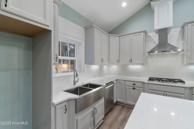 This brand new Riptide home with stunning setting and finishes on Sea Trail Golf Resort in North Carolina - for sale on GolfHomes.com, golf home, golf lot