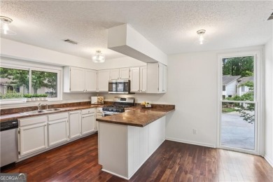 Welcome to this spacious and versatile end-unit townhome in the on Indian Hills Country Club in Georgia - for sale on GolfHomes.com, golf home, golf lot