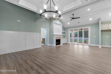 This brand new Riptide home with stunning setting and finishes on Sea Trail Golf Resort in North Carolina - for sale on GolfHomes.com, golf home, golf lot