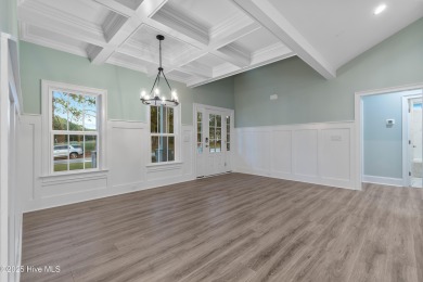 This brand new Riptide home with stunning setting and finishes on Sea Trail Golf Resort in North Carolina - for sale on GolfHomes.com, golf home, golf lot