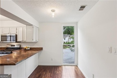Welcome to this spacious and versatile end-unit townhome in the on Indian Hills Country Club in Georgia - for sale on GolfHomes.com, golf home, golf lot
