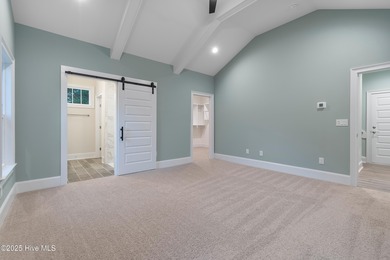 This brand new Riptide home with stunning setting and finishes on Sea Trail Golf Resort in North Carolina - for sale on GolfHomes.com, golf home, golf lot