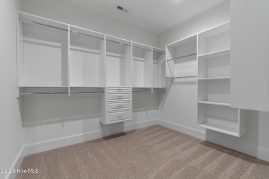 This brand new Riptide home with stunning setting and finishes on Sea Trail Golf Resort in North Carolina - for sale on GolfHomes.com, golf home, golf lot