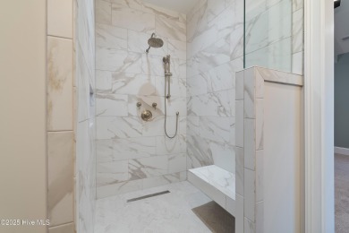 This brand new Riptide home with stunning setting and finishes on Sea Trail Golf Resort in North Carolina - for sale on GolfHomes.com, golf home, golf lot