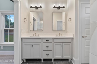 This brand new Riptide home with stunning setting and finishes on Sea Trail Golf Resort in North Carolina - for sale on GolfHomes.com, golf home, golf lot