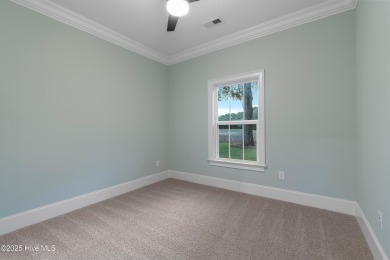 This brand new Riptide home with stunning setting and finishes on Sea Trail Golf Resort in North Carolina - for sale on GolfHomes.com, golf home, golf lot