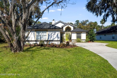 Welcome to your dream retreat! Stunning views of a pond and on Blue Cypress Golf Club in Florida - for sale on GolfHomes.com, golf home, golf lot