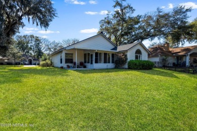 Welcome to your dream retreat! Stunning views of a pond and on Blue Cypress Golf Club in Florida - for sale on GolfHomes.com, golf home, golf lot