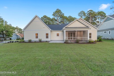 This brand new Riptide home with stunning setting and finishes on Sea Trail Golf Resort in North Carolina - for sale on GolfHomes.com, golf home, golf lot