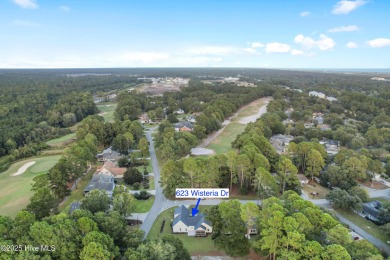 This brand new Riptide home with stunning setting and finishes on Sea Trail Golf Resort in North Carolina - for sale on GolfHomes.com, golf home, golf lot