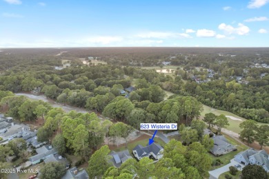 This brand new Riptide home with stunning setting and finishes on Sea Trail Golf Resort in North Carolina - for sale on GolfHomes.com, golf home, golf lot