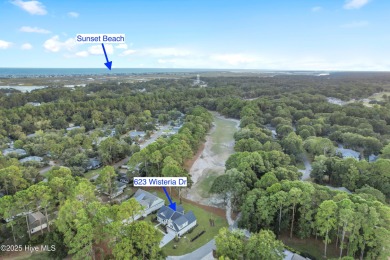 This brand new Riptide home with stunning setting and finishes on Sea Trail Golf Resort in North Carolina - for sale on GolfHomes.com, golf home, golf lot