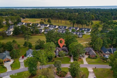 This stately brick home in Brandywine Bay enjoys a prime setting on Brandywine Bay Golf Club in North Carolina - for sale on GolfHomes.com, golf home, golf lot