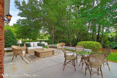 This stately brick home in Brandywine Bay enjoys a prime setting on Brandywine Bay Golf Club in North Carolina - for sale on GolfHomes.com, golf home, golf lot
