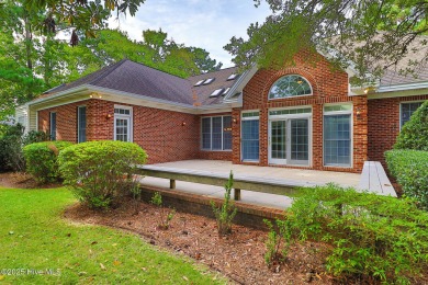 This stately brick home in Brandywine Bay enjoys a prime setting on Brandywine Bay Golf Club in North Carolina - for sale on GolfHomes.com, golf home, golf lot