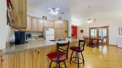 This 2-bedroom, 3-bathroom home is located in Country Club on Headwaters Country Club in Minnesota - for sale on GolfHomes.com, golf home, golf lot