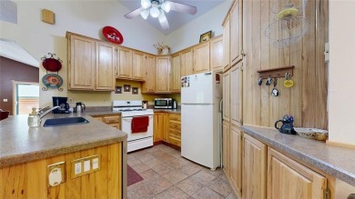 This 2-bedroom, 3-bathroom home is located in Country Club on Headwaters Country Club in Minnesota - for sale on GolfHomes.com, golf home, golf lot