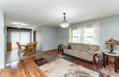 Ideally situated on a corner lot, this well-kept rambler offers on Dodge Country Club in Minnesota - for sale on GolfHomes.com, golf home, golf lot