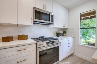 Beautifully remodeled upper-level unit boasting dazzling on Oak Creek Golf Club in California - for sale on GolfHomes.com, golf home, golf lot