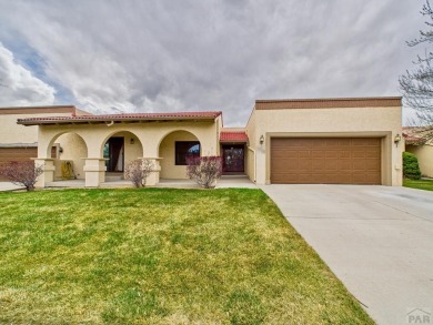 Spacious 2,028 sq ft Spanish Mediterranean-style townhome on Desert Hawk At Pueblo West in Colorado - for sale on GolfHomes.com, golf home, golf lot
