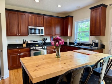 Nestled high on Eagle Ridge, this gorgeous 4-bedroom, 2 on Shaker Run Golf Club  in Ohio - for sale on GolfHomes.com, golf home, golf lot