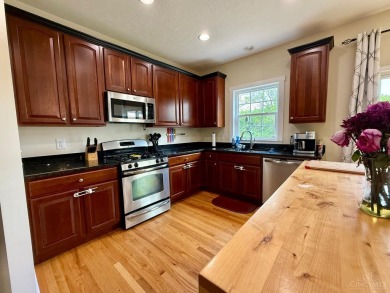 Nestled high on Eagle Ridge, this gorgeous 4-bedroom, 2 on Shaker Run Golf Club  in Ohio - for sale on GolfHomes.com, golf home, golf lot
