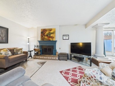 Spacious 2,028 sq ft Spanish Mediterranean-style townhome on Desert Hawk At Pueblo West in Colorado - for sale on GolfHomes.com, golf home, golf lot