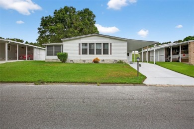 This beautiful open floorplan 2 bedroom/2 bath overlooks some of on Zellwood Station Country Club in Florida - for sale on GolfHomes.com, golf home, golf lot
