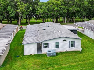 This beautiful open floorplan 2 bedroom/2 bath overlooks some of on Zellwood Station Country Club in Florida - for sale on GolfHomes.com, golf home, golf lot
