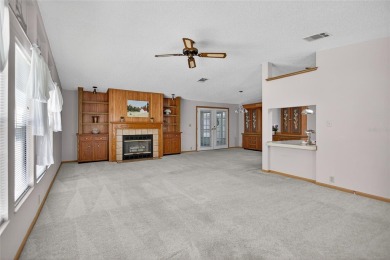 This beautiful open floorplan 2 bedroom/2 bath overlooks some of on Zellwood Station Country Club in Florida - for sale on GolfHomes.com, golf home, golf lot