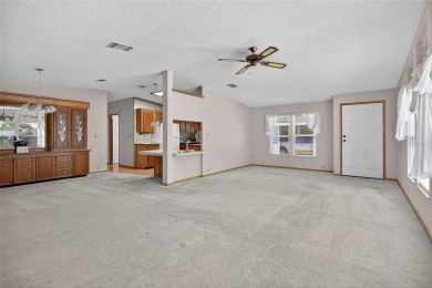 This beautiful open floorplan 2 bedroom/2 bath overlooks some of on Zellwood Station Country Club in Florida - for sale on GolfHomes.com, golf home, golf lot