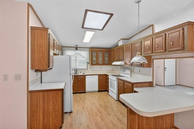 This beautiful open floorplan 2 bedroom/2 bath overlooks some of on Zellwood Station Country Club in Florida - for sale on GolfHomes.com, golf home, golf lot