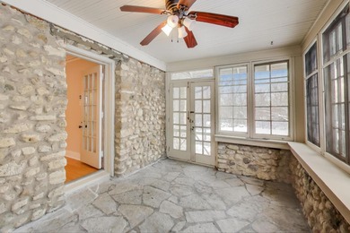 Tucked beneath a canopy of towering trees, located on a quiet on Biltmore Country Club in Illinois - for sale on GolfHomes.com, golf home, golf lot