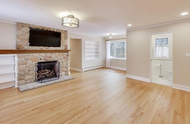 Tucked beneath a canopy of towering trees, located on a quiet on Biltmore Country Club in Illinois - for sale on GolfHomes.com, golf home, golf lot