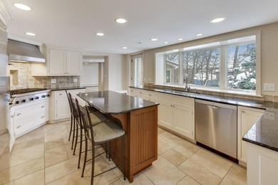 Tucked beneath a canopy of towering trees, located on a quiet on Biltmore Country Club in Illinois - for sale on GolfHomes.com, golf home, golf lot