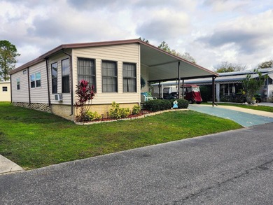Welcome! This very clean, very well maintained 2/2 is bright on Grasslands Golf and Country Club in Florida - for sale on GolfHomes.com, golf home, golf lot