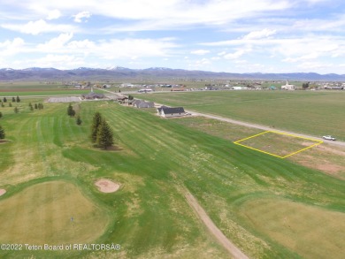 This great building lot surrounded by mountains is located in on Valli Vu Golf Course in Wyoming - for sale on GolfHomes.com, golf home, golf lot