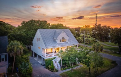 This beautiful island home is mere steps from  the beach access on Wild Dunes Harbor Golf Resort in South Carolina - for sale on GolfHomes.com, golf home, golf lot