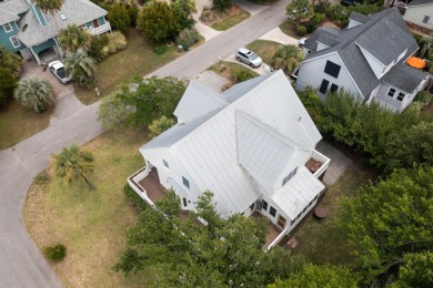 This beautiful island home is mere steps from  the beach access on Wild Dunes Harbor Golf Resort in South Carolina - for sale on GolfHomes.com, golf home, golf lot