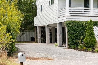 This beautiful island home is mere steps from  the beach access on Wild Dunes Harbor Golf Resort in South Carolina - for sale on GolfHomes.com, golf home, golf lot