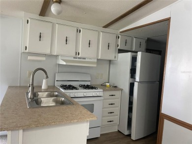 SELLER MOTIVATED: PRICE REDUCED: WEST VIEW RIDGE 55+ COMMUNITY on Southern Dunes Golf and Country Club in Florida - for sale on GolfHomes.com, golf home, golf lot