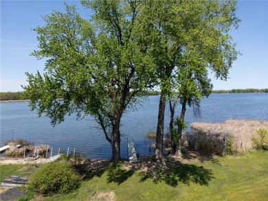 Nature abounds with sightings of great blue herons and bald on Chomonix Golf Course in Minnesota - for sale on GolfHomes.com, golf home, golf lot
